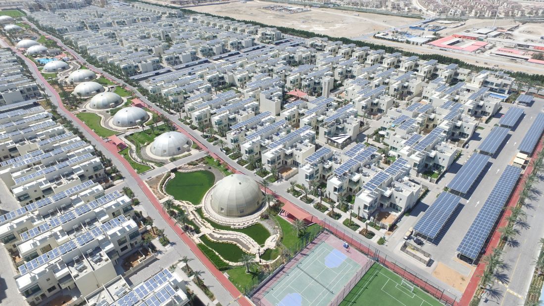 Cities and their inhabitants produce huge amounts of green house gases, contributing to global warming and environmental damage. In response, a number of communities are focused on reducing their carbon-emissions, with some attempting to go entirely carbon-free. <br /><br />The Sustainable City in Dubai, a 500-home complex outside Dubai City, proposes one solution. Scroll through the gallery to discover how other communities are living sustainably.