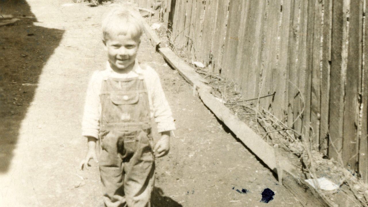 Linro Meade was the last child of 14 born to Robert and Myrtie Meade. In this photo, he is about 3 years old in the backyard of the home where the family lived in Eastern Kentucky.