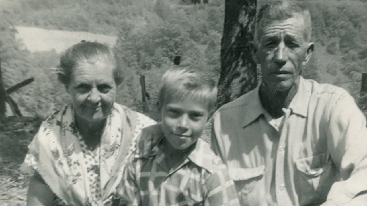 Linro Meade at age 10, pictured with his father, Robert Meade, and stepmother, Julie. His birth mother, Myrtie Meade, died of cancer when Linro was 9.