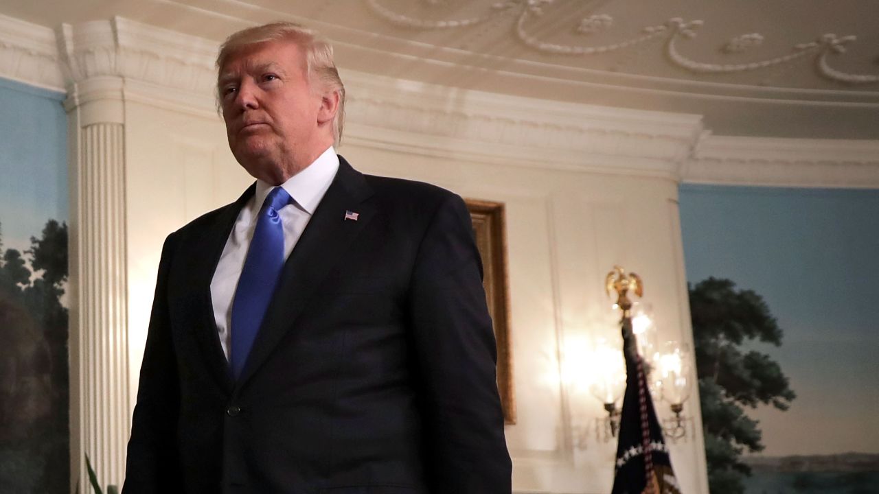 WASHINGTON, DC - JUNE 14:  U.S. President Donald Trump leaves after delivering brief remarks in the Diplomatic Room following a shooting that injured a member of Congress and law enforcement officers at the White House June 14, 2017 in Washington, DC. Trump announced that the suspected gunman, 66-year-old James T. Hodgkinson of Belleville, Illinois, was killed in the attack. (Photo by Chip Somodevilla/Getty Images)