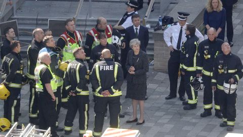 Prime Minister Theresa May was criticized for a low-key visit to the disaster scene.