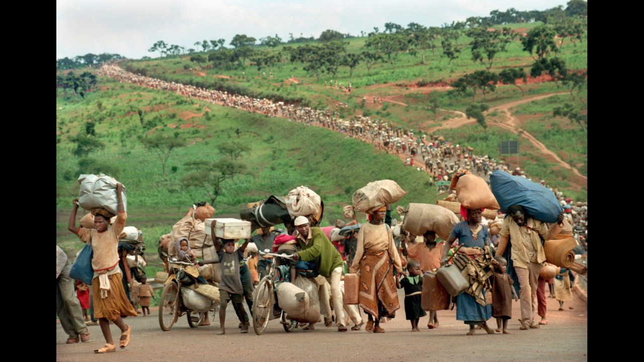 In 1994, violence erupted in Rwanda in horrifying fashion, as Hutu extremists slaughtered an estimated 800,000 people in just 100 days. The impacts of the genocide rippled across the country for years. This Pulitzer Prize-winning photo taken by photographer Martha Rial in December 1996 captured hundreds of Rwandan Hutu refugees migrating with as much as they could carry after they were turned back by Tanzanian soldiers.