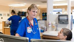 Dawn Nagel, a sepsis nurse, spends her day trying to identify and treat sepsis patients quickly so they don't deteriorate. (Heidi de Marco/KHN)