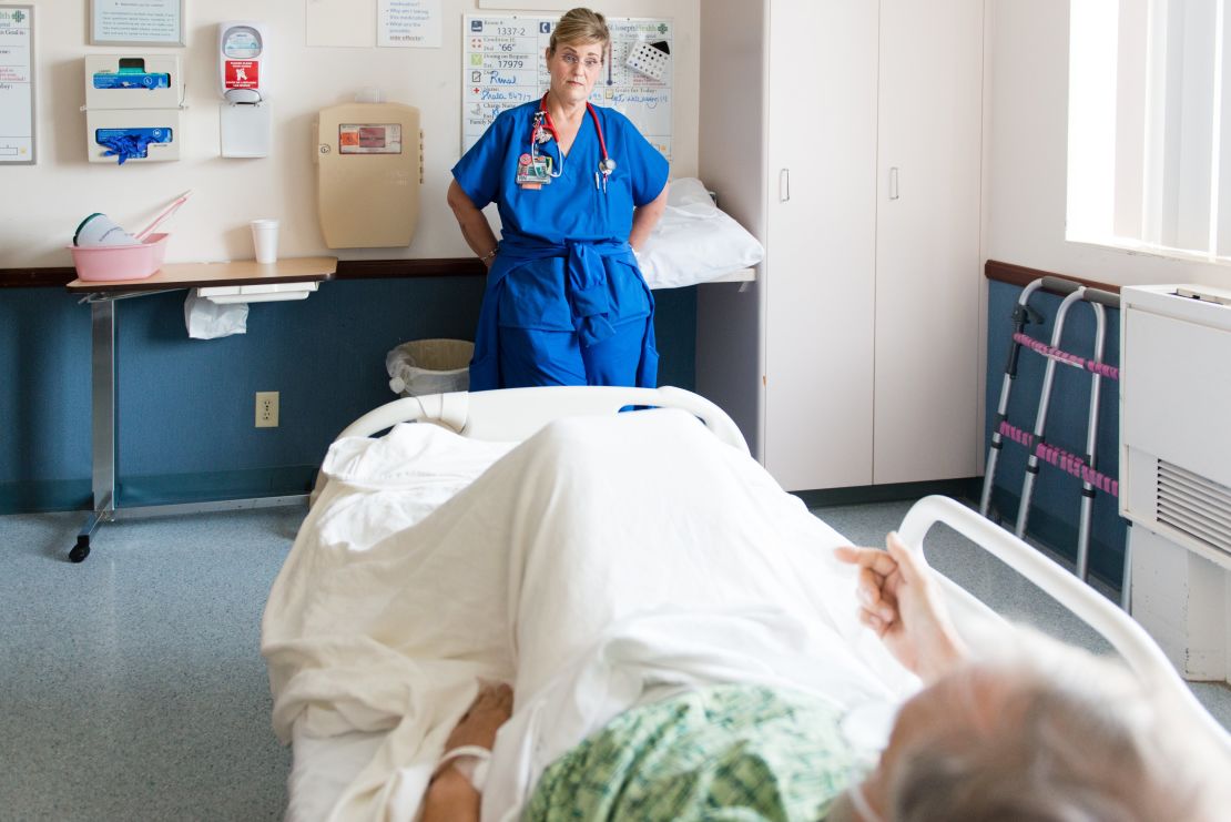 Dawn Nagel checks in on Scott Steffens at St. Joseph Hoag Health in Orange County, California.