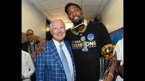 NBA legend Jerry West (left) -- seen posing with Kevin Durant of the Golden State Warriors -- says he has battled depression his entire life. The nine-time NBA champion as a player and executive says basketball provided solace from his abusive father growing up. "I was looking for an escape," he told USA Today. "I was just looking for something that I would be appreciated for."