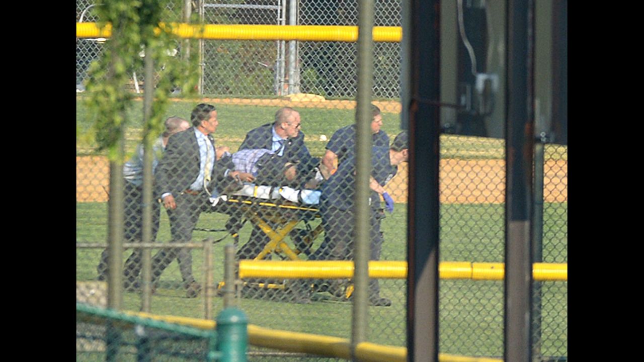 A wounded person is stretchered away from a baseball field in Alexandria, Virginia, on Wednesday, June 14. A gunman <a href="http://www.cnn.com/2017/06/14/politics/gallery/virginia-gop-shooting/index.html" target="_blank">opened fire on Republican congressmen</a> as they practiced baseball at the field. House Majority Whip Steve Scalise, a congressional staffer, a lobbyist and two members of the congressional police force were among those injured, officials said. The alleged gunman was killed.