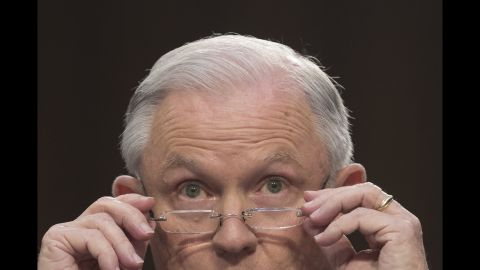 Attorney General Jeff Sessions puts on his glasses while <a href="http://www.cnn.com/interactive/2017/06/politics/sessions-senate-testimony/" target="_blank">testifying before the Senate Intelligence Committee</a> on Tuesday, June 13. Sessions told the committee he never met with officials from Russia or anywhere else about interference in last year's election, and he said any suggestion of that "is an appalling and detestable lie." He also defended his decision to participate in the firing of FBI Director James Comey, although he declined to talk about the reasons why Comey was fired.