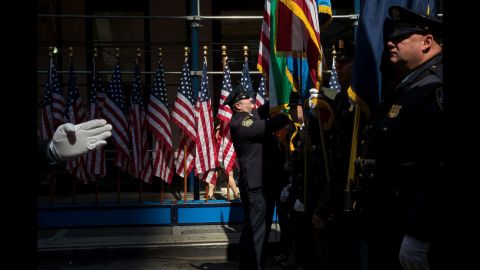 Members of the New York City Police Department prepare for the opening ceremony of a new 9/11 Tribute Museum on Tuesday, June 13.