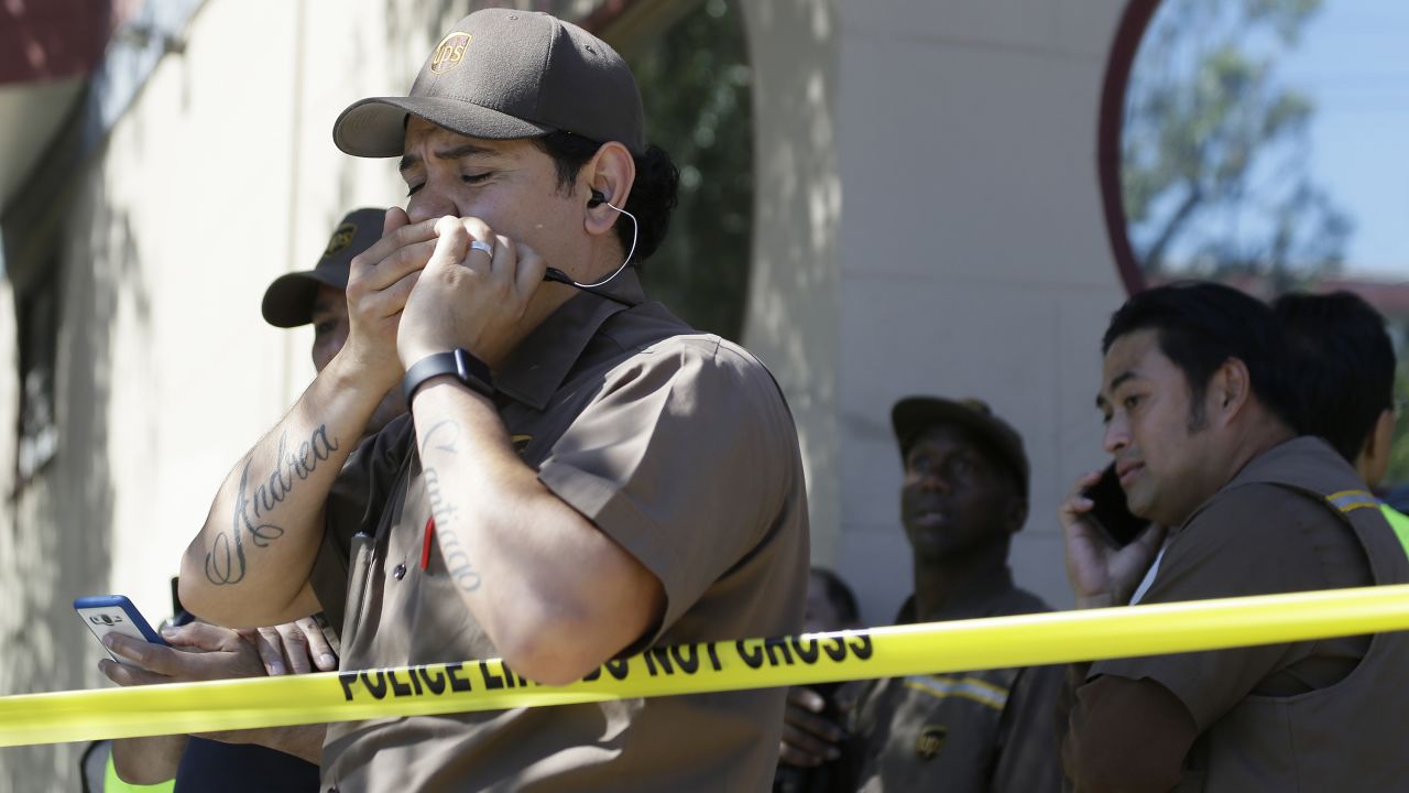 UPS workers gather outside a package delivery warehouse where <a href="http://www.cnn.com/2017/06/14/us/san-francisco-shooting/index.html" target="_blank">a deadly shooting</a> took place in San Francisco on Wednesday, June 14. A gunman killed three men at the facility and then himself. Two others were shot but survived.