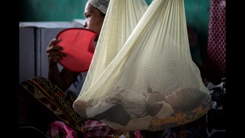 A woman and her baby rest at an evacuation center in Iligan, Philippines, on Thursday, June 15. They had fled the nearby city of Marawi, where government forces <a href="http://www.cnn.com/2017/06/12/asia/philippines-isis-marawi-duterte/index.html" target="_blank">have been battling ISIS-affiliated militants.</a>