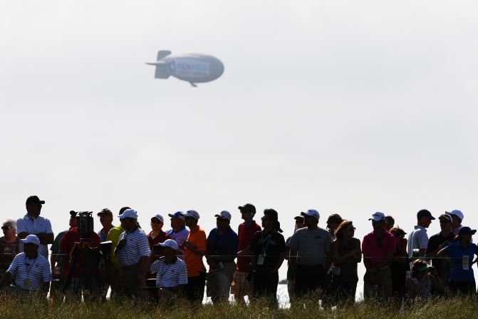 Early on day one of the 117th US Open spectators and players saw a blimp fall out of the sky near the Erin Hills course in Wisconsin. The pilot was taken to hospital with "serious burns," according to the Washington County Sheriff's Office.