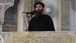 (FILES) This image grab taken from a propaganda video released on July 5, 2014 by al-Furqan Media allegedly shows the leader of the Islamic State (IS) jihadist group, Abu Bakr al-Baghdadi, aka Caliph Ibrahim, adressing Muslim worshippers at a mosque in the militant-held northern Iraqi city of Mosul. 
The Russian army on June 16, 2017 said it hit Islamic State leaders in an airstrike in Syria last month and was seeking to verify whether IS chief Abu Bakr al-Baghdadi had been killed. In a statement, the army said Sukhoi warp