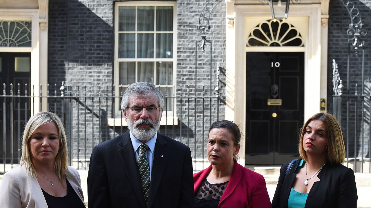 LONDON, ENGLAND - JUNE 15:  Gerry Adams, President of Sinn Féin (2nd L) and Michelle O'Neill, leader of Sinn Féin (L) stand with colleagues as they speak to the media outside 10 Downing Street on June 15, 2017 in London, England. Prime Minister Theresa May held a series of meetings with the main Northern Ireland political parties today to allay mounting concerns over a government deal with the DUP in the wake of the UK general election.  (Photo by Chris J Ratcliffe/Getty Images)