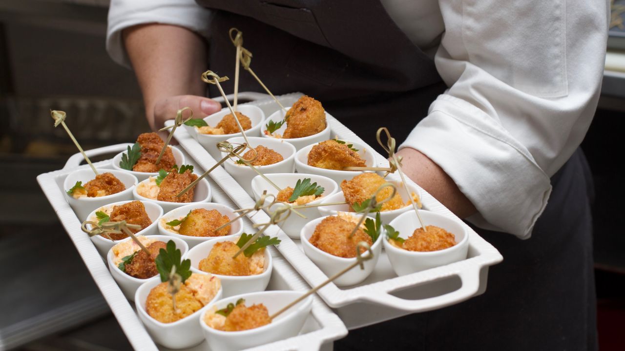 Chef Annie Pettry prepares buttermilk hush puppies with 12 Pepper Jam and Pimento Cheese. 