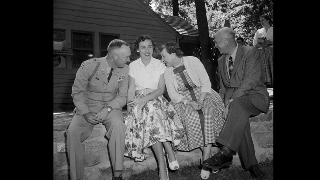 President Dwight Eisenhower enjoys a picnic with his family, August 1954. 