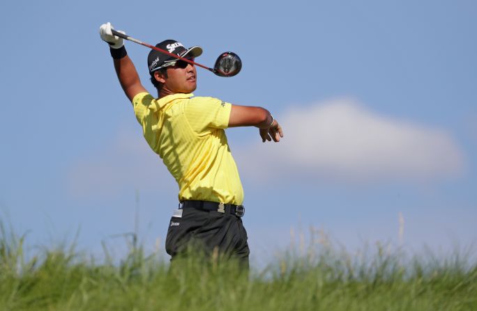 Japan's Hideki Matsuyama was on target to break the major championship scoring record of 63 at seven under after 13 holes, but five pars coming home gave him a 65. 