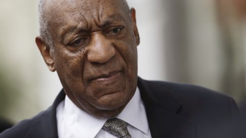 Bill Cosby leaves court Saturday after a mistrial was declared.