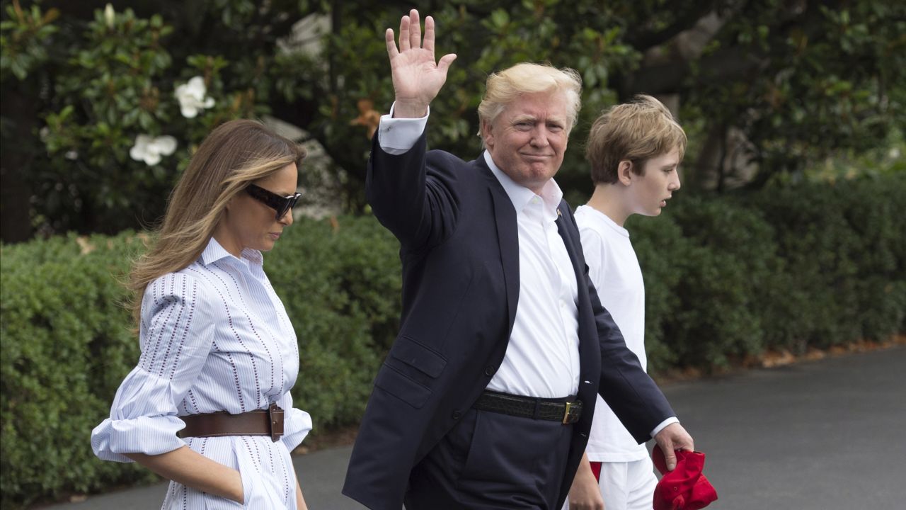 U.S. President Donald J. Trump boards Marine One with first lady Melania Trump and their son Barron Trump, as they depart the White House for Camp David, June 17, 2017 in Washington, DC. 