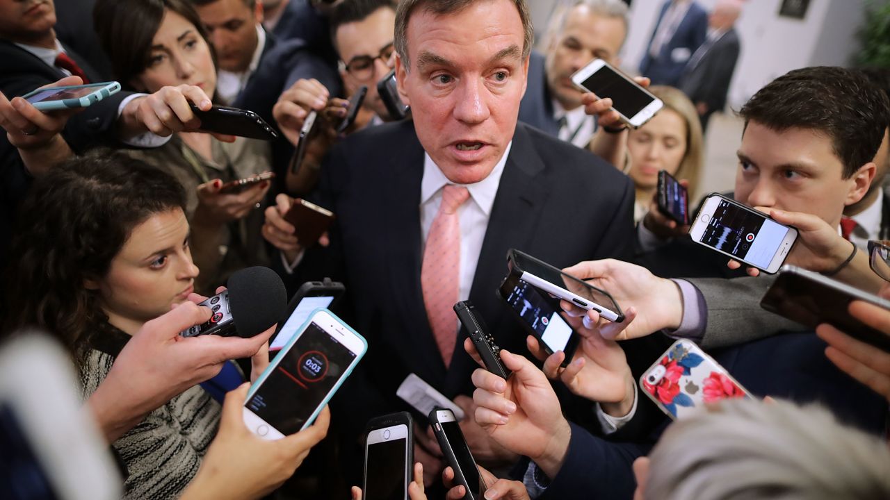 WASHINGTON, DC - MAY 16: Reporters surround Senate Intelligence Committee ranking member Sen. Mark Warner (D-VA) as he heads for his party's weekly policy luncheon at the U.S. Capitol May 16, 2017 in Washington, DC. Many Republican and Democratic senators expressed frustration and concern about how President Donald Trump may have shared classified intelligence with the Russian foreign minister last week at the White House. (Photo by Chip Somodevilla/Getty Images)