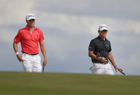 Koepka held off third-round leader Brian Harman (right), while Justin Thomas (left) faded after his US Open record low round in relation to par of nine-under 63 Saturday.