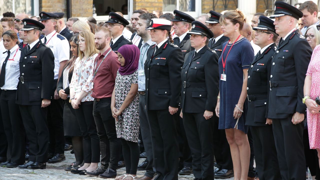 London Fire Brigade Commissioner Dany Cotton (centre) joins firefighters and LFB staff at Winchester House, in central London, to observe a minute's silence in memory of those people who died in last week's fire at Grenfell Tower. (Photo by Yui Mok/PA Images via Getty Images)