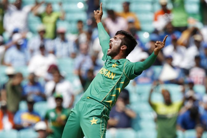 Pakistan's Mohammad Amir tore through India's top order to help reduce the defending champions to 54-5.