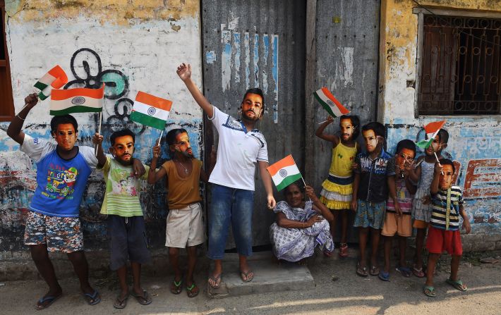 Young Indian cricket fans in Kolkata, West Bengal -- wearing face masks of their favorite players, including India's captain Virat Kohli -- were full of hope for the defending champions. 
