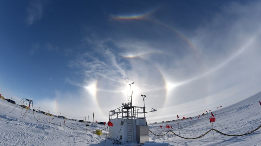 A "sun dog" is seen above an ARM (Atmospheric Radiation Measurement) instrument in West Antarctica, just before the effects of an extensive summer surface melt event occurred.