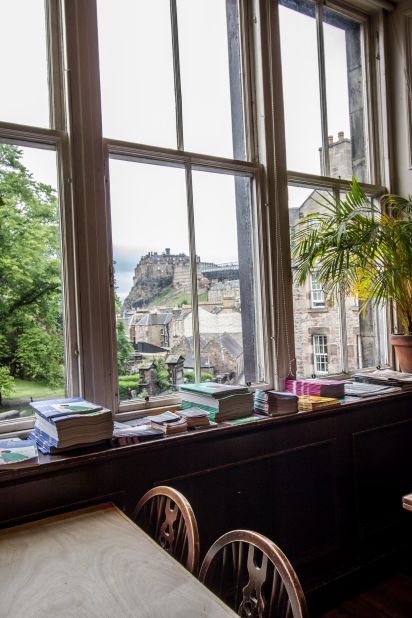 <strong>Best seat in the house: </strong>Want to follow in Rowling's footsteps? The best seat in the cafe is this one, by the window, offering a stunning view of Edinburgh Castle.