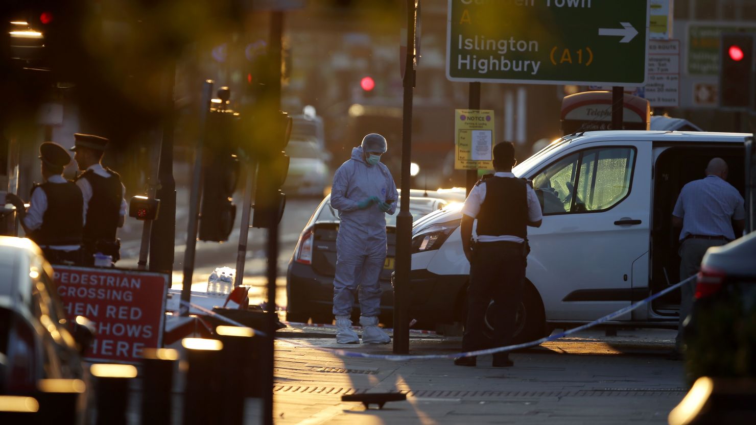 Forensic investigators at the scene of the incident in Finsbury Park, north London, on June 19.