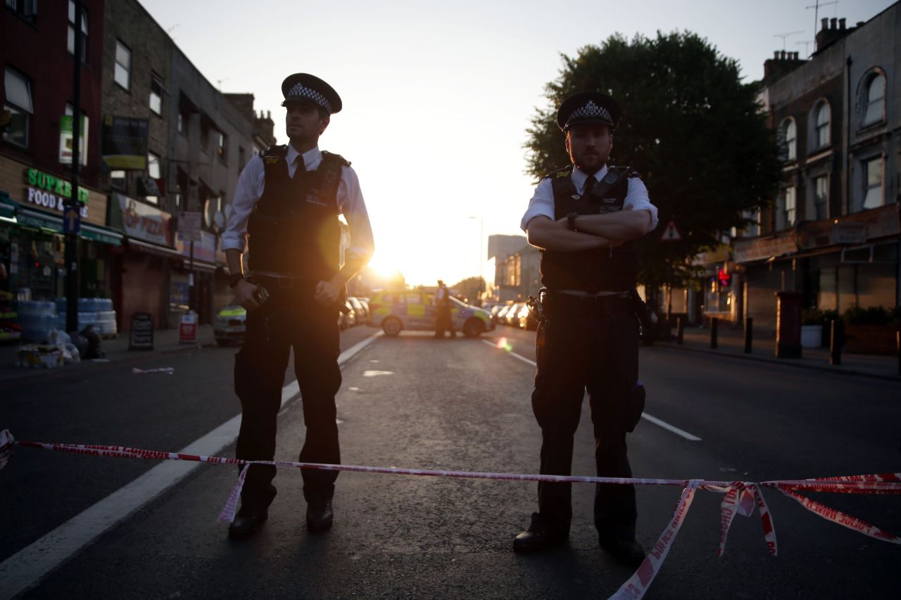 Police guard a street in the Finsbury Park area.