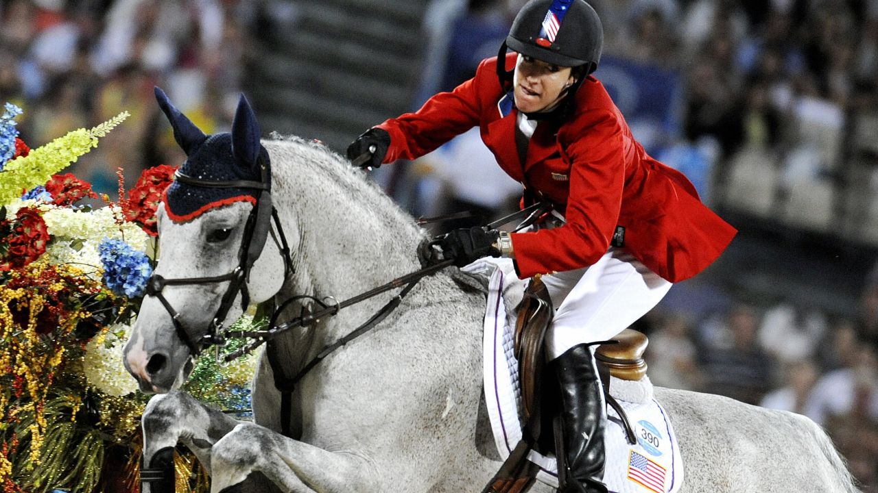 Laura Kraut of the US rides with "Cedric" during the equestrian jumping individual competition in Hong Kong on August 21, 2008 during the 2008 Beijing Olympic Games.       AFP PHOTO / DDP / DAVID HECKER  (Photo credit should read DAVID HECKER/AFP/Getty Images)