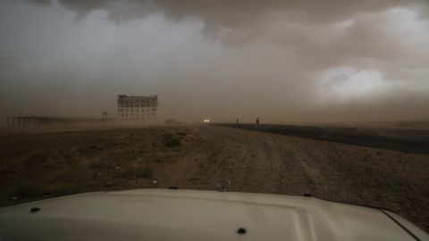 A sandstorm barrels across the landscape near Abs, a sprawling settlement for  internally displaced people in Yemen. The UN Office for the Coordination of Humanitarian Affairs (OCHA) says more than 3 million Yemenis are displaced.