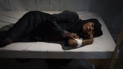 A suspected cholera patient lies on a wooden bed in a hospital in Al Hudaydah. According to the World Health Organization, there are 167,000 cholera cases across the country, and more than 1,100 people have died of the disease.