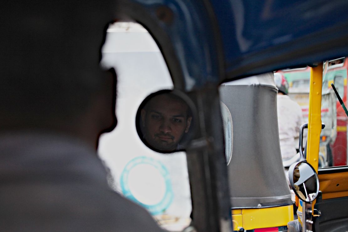 Priyank Mathur rides in a rickshaw through Mumbai. 