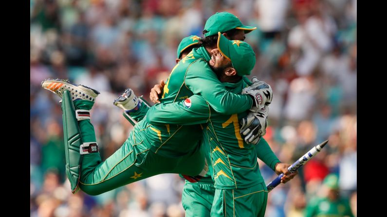 Pakistan players celebrate after stunning India in <a href="index.php?page=&url=http%3A%2F%2Fwww.cnn.com%2F2017%2F06%2F18%2Fsport%2Fpakistan-india-champions-trophy-cricket%2Findex.html" target="_blank">the Champions Trophy cricket final</a> on Sunday, June 18. India was the defending champion and a heavy favorite.