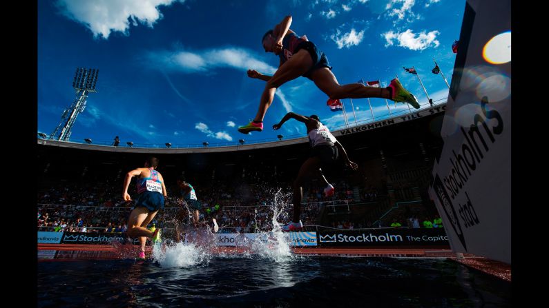 Athletes run the 3,000-meter steeplechase during the Diamond League meet in Stockholm, Sweden, on Sunday, June 18.