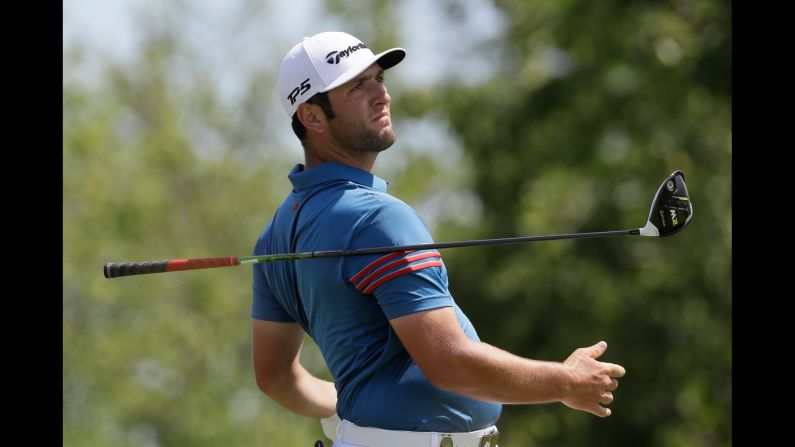 Jon Rahm drops his club after a tee shot at the US Open on Friday, June 16. Rahm missed the cut by four strokes.