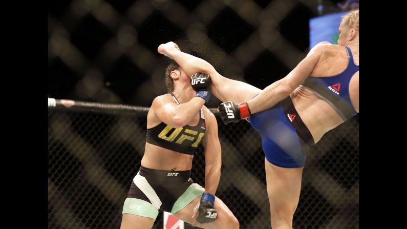 Holly Holm knocks out Bethe Correia with a head kick during their UFC fight in Singapore on Saturday, June 17. It was Holm's first win since knocking out Ronda Rousey in 2015.