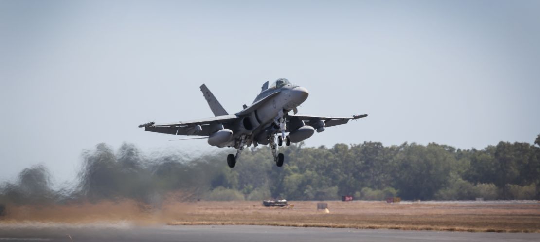 Australian forces have suspended air strikes.