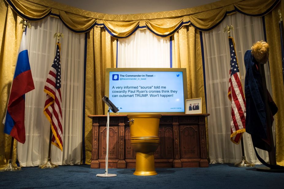 A golden toilet sat in an Oval Office replica where guests were able to sit and send tweets. 