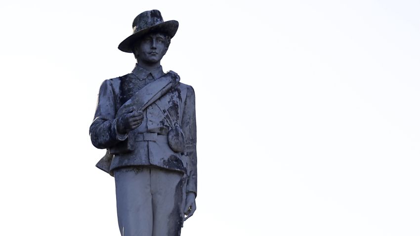 A statue of a Confederate soldier constructed in 1911 in displayed in a downtown park and will be moved to a nearby cemetery after it was decided in a hearing with supporters and protestors of the statue, Tuesday, May 16, 2017, in Orlando, Fla. (AP Photo/John Raoux)