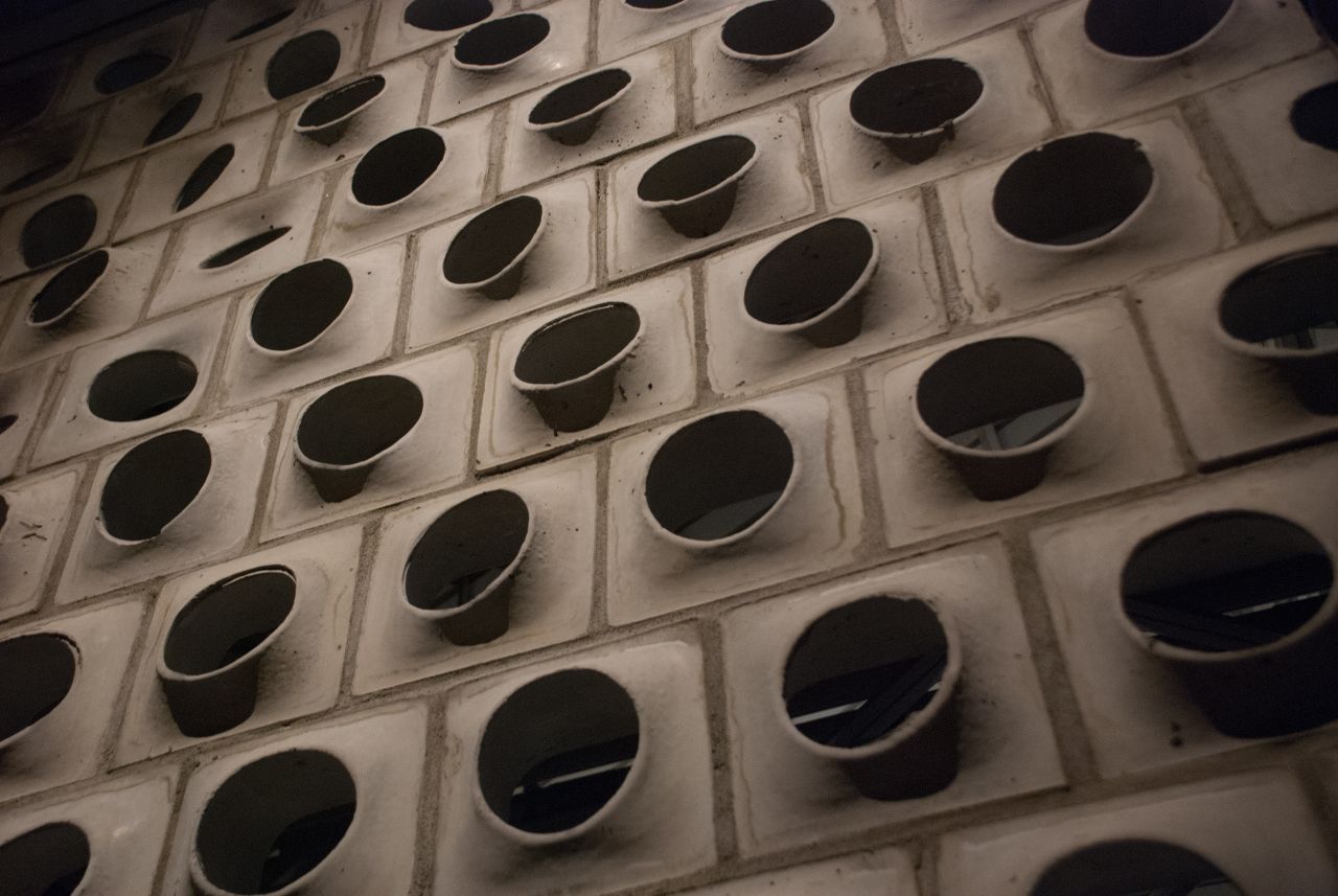 Angdong Hospital's facade is made from concrete blocks with holes punched through their centers. The blocks -- seen here on display at the Milan Triennial in 2016 -- were designed in collaboration with local manufacturers in Angdong. 