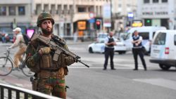 A Belgian Army soldier stands outside Central Station after a reported explosion in Brussels on Tuesday, June 20, 2017. Belgian media are reporting that explosion-like noises have been heard at a Brussels train station, prompting the evacuation of a main square. (AP Photo/Geert Vanden Wijngaert)