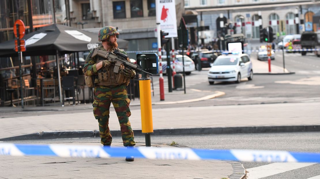 A soldier secures an area outside Brussels Central Station.