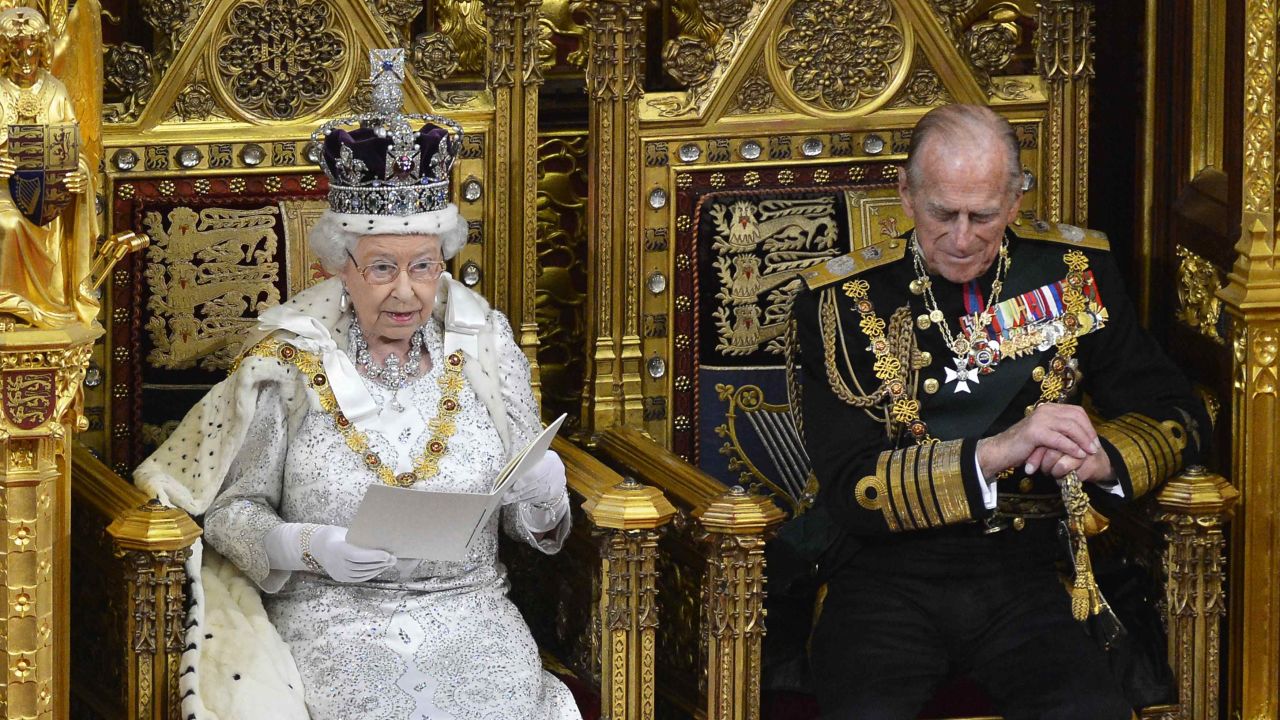 Queen Elizabeth II sits on a gilded throne as she delivers her speech on May 8, 2013.