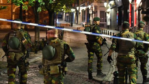 Belgian soldiers patrol Tuesday night near Brussels Central Station after the partial explosion.