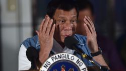 Philippines' President Rodrigo Duterte gestures while delivering a speech, during a vist to an evacuation centre for Marawi residents, in Iligan on the southern island of Mindanao on June 20, 2017.
President Rodrigo Duterte apologized on June 20 for aerial bombings that have destroyed a large part of the Philippines' main Muslim city but said it was necessary to crush self-styled Islamic State followers. / AFP PHOTO / Ted ALJIBE        (Photo credit should read TED ALJIBE/AFP/Getty Images)