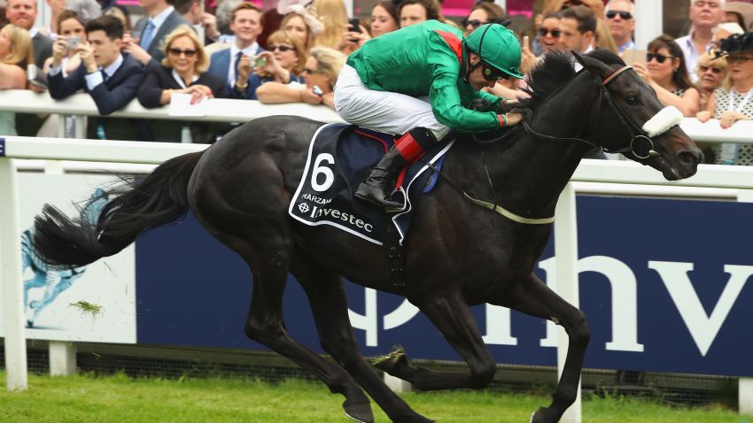 EPSOM, ENGLAND - JUNE 04:  Number Six, Harzand  wins the Investec Epsom Derby at Epsom Racecourse on June 4, 2016 in Epsom, England.  (Photo by Andrew Redington/Getty Images)