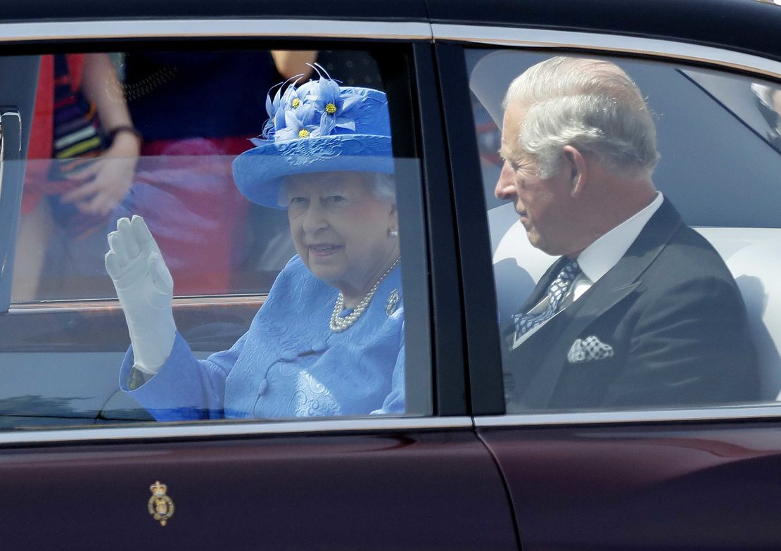 Queen Elizabeth II leaves Buckingham Palace with Prince Charles on Wednesday. 